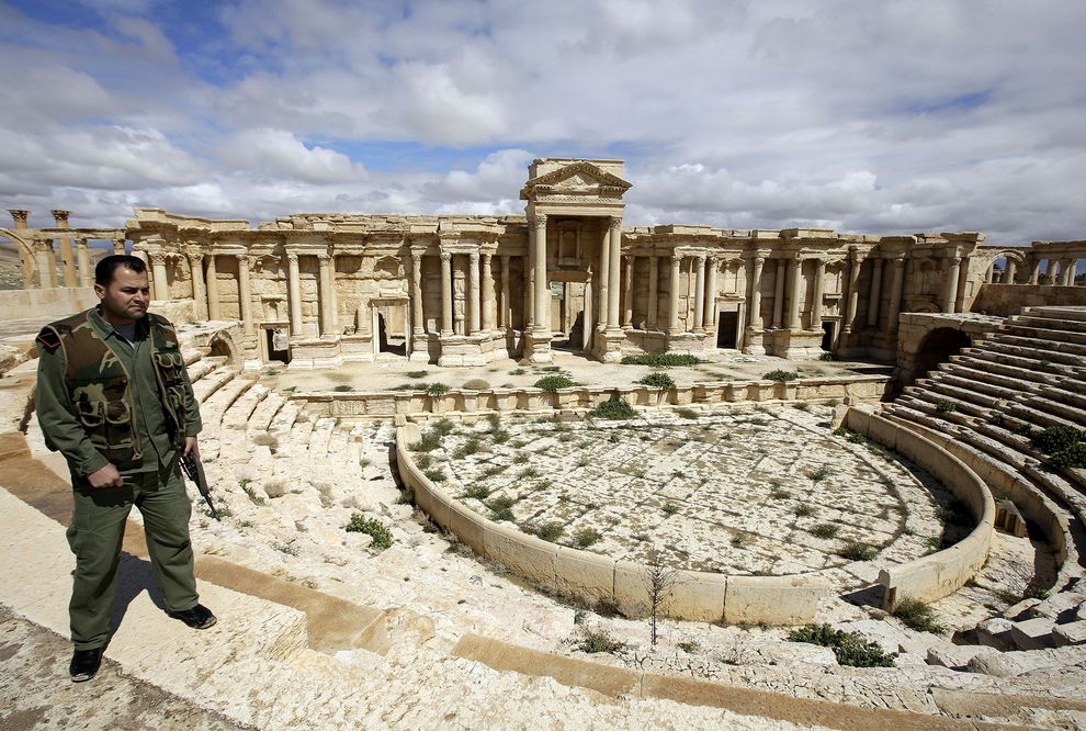 A Syrian policeman patrols the ancient city of Palmyra. PHOTOGRAPH BY JOSEPH EID/AFP/GETTY IMAGES